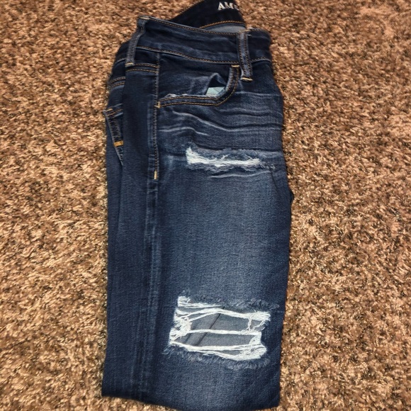 Ripped blue jeans - Picture 2 of 3